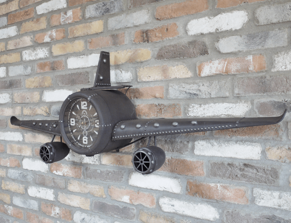 Horloge murale en forme d’avion