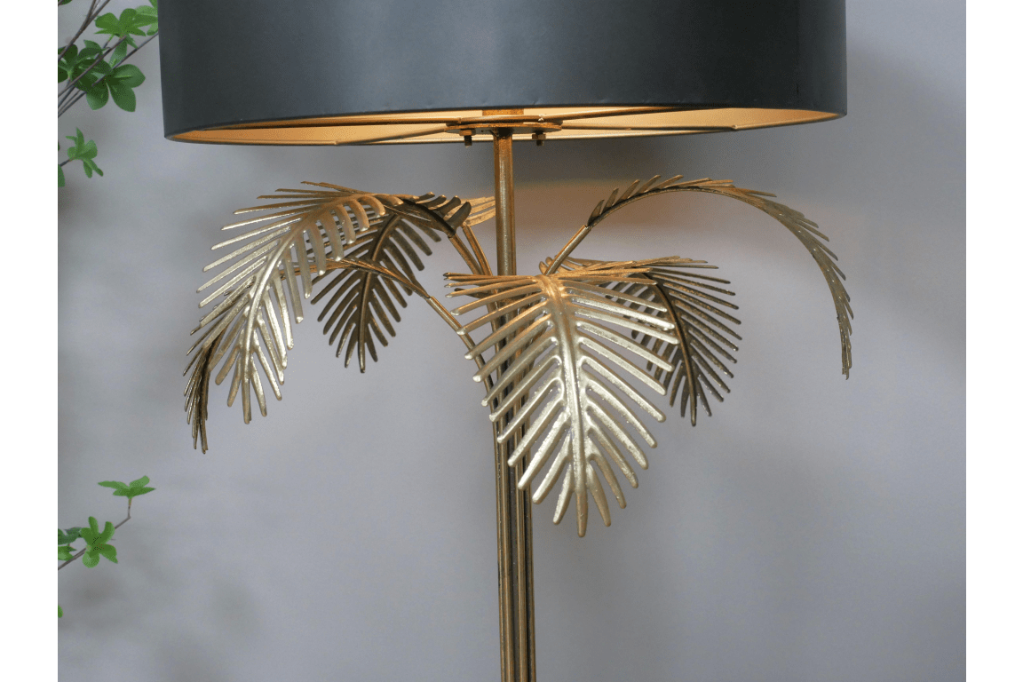 Lampe sur pied métallique dorée avec feuillage